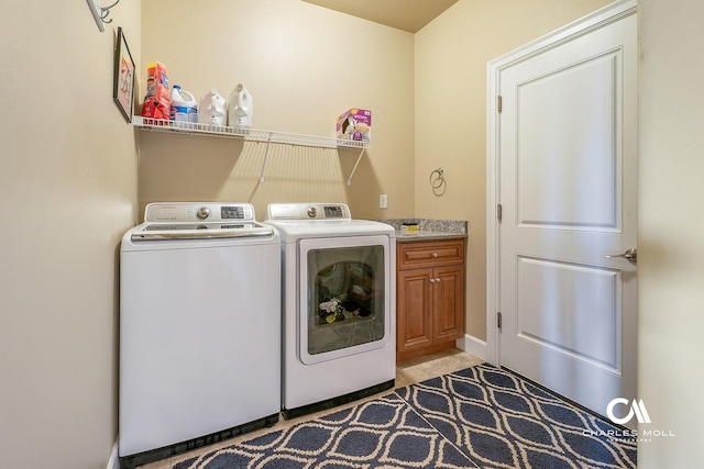 339 Elouise Cobell St, Helena, MT 59601 - laundry area featuring washer and dryer and cabinet space