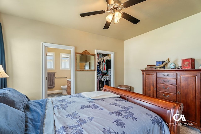 339 Elouise Cobell St, Helena, MT 59601 - bedroom featuring a spacious closet, ensuite bathroom, a closet, a ceiling fan, and carpet floors