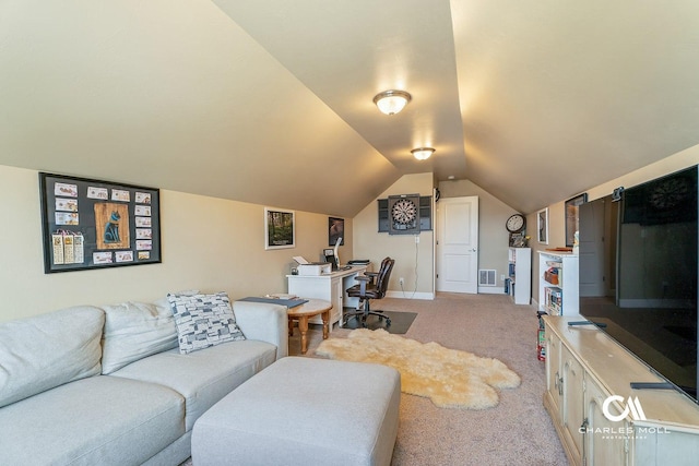 339 Elouise Cobell St, Helena, MT 59601 - living room with light colored carpet, vaulted ceiling, a desk, and baseboards