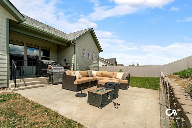 339 Elouise Cobell St, Helena, MT 59601 - fenced backyard featuring an outdoor living space, a patio, and a grill
