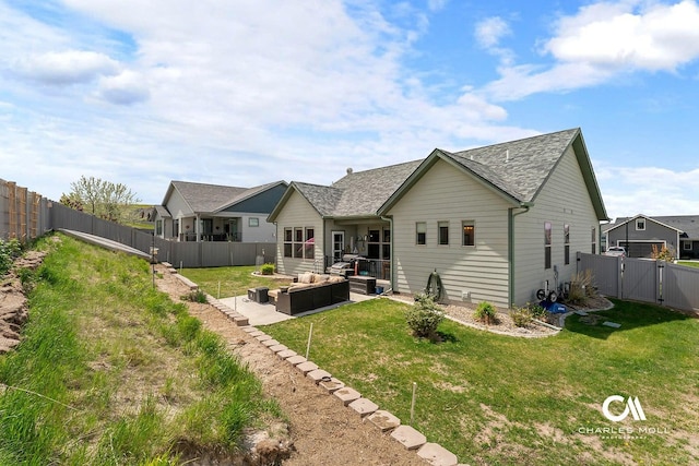 339 Elouise Cobell St, Helena, MT 59601 - back of house with an outdoor living space, a patio, a gate, and a shingled roof
