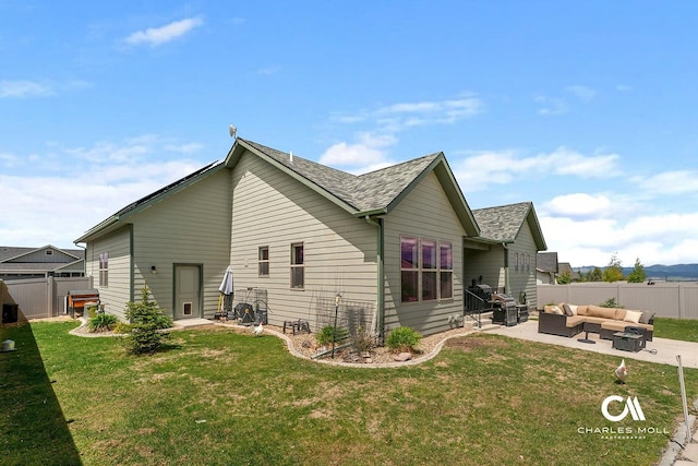 339 Elouise Cobell St, Helena, MT 59601 - back of house with outdoor lounge area, a patio area, and roof with shingles