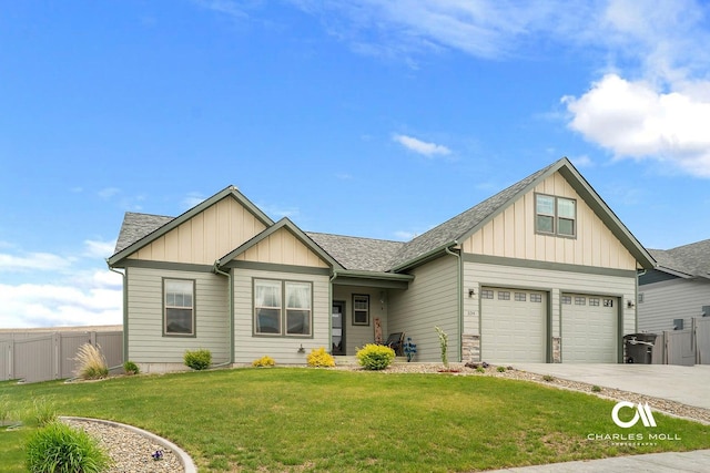 339 Elouise Cobell St, Helena, MT 59601 - view of front facade with board and batten siding, driveway, and roof with shingles