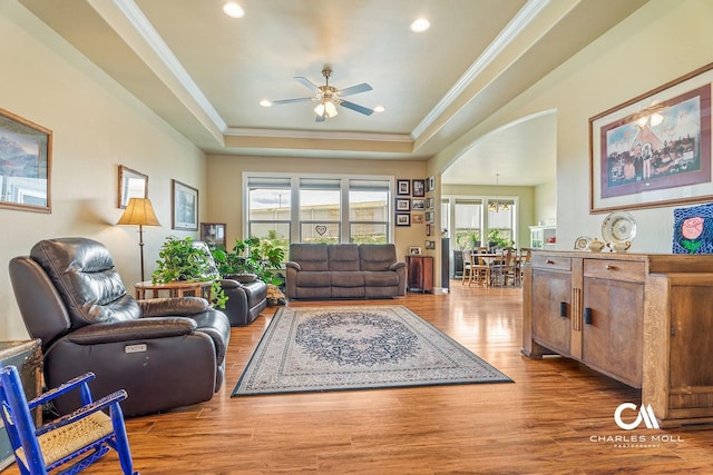 339 Elouise Cobell St, Helena, MT 59601 - living area featuring ceiling fan, wood finished floors, a raised ceiling, crown molding, and recessed lighting