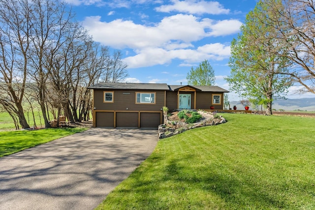 51943 Kuntz Ln, Charlo, MT 59824 - single story home with a garage, driveway, and a front yard