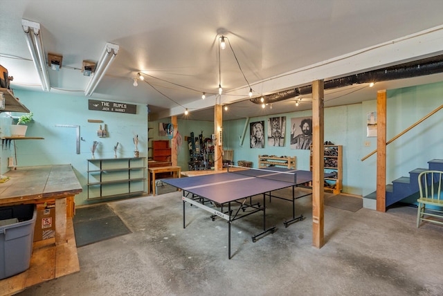 51943 Kuntz Ln, Charlo, MT 59824 - playroom featuring a workshop area and unfinished concrete flooring