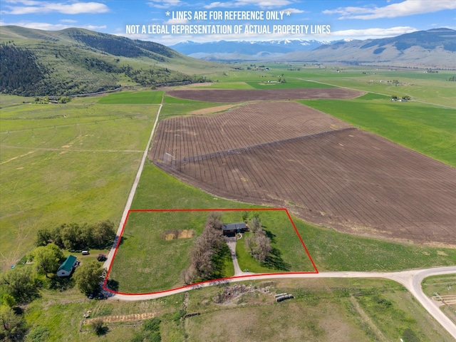 51943 Kuntz Ln, Charlo, MT 59824 - aerial view of sparsely populated area featuring mountains and property boundaries highlighted