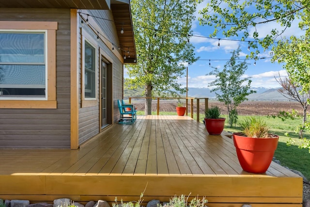 51943 Kuntz Ln, Charlo, MT 59824 - wooden deck featuring a mountain view
