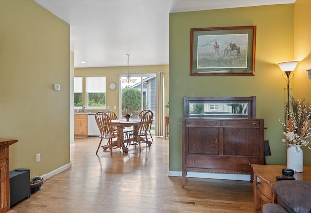 5015 Pius Way, Missoula, MT 59808 - entrance foyer featuring light wood-type flooring, a chandelier, and baseboards