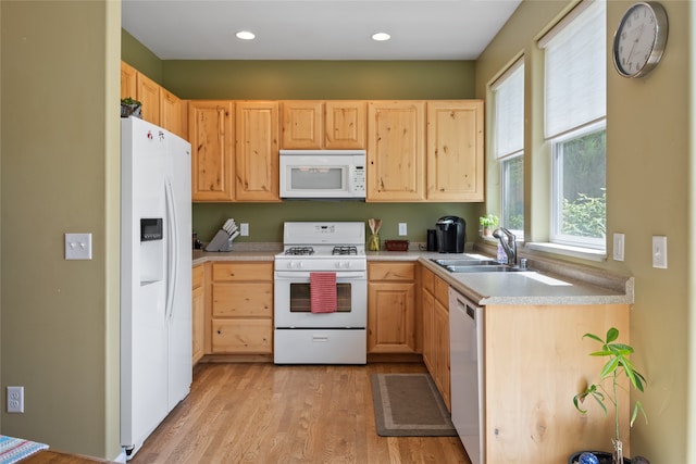 5015 Pius Way, Missoula, MT 59808 - kitchen with white appliances, light brown cabinetry, a sink, and recessed lighting