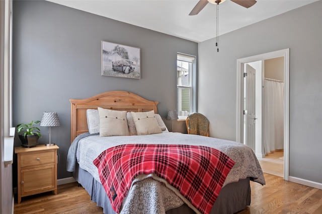 5015 Pius Way, Missoula, MT 59808 - bedroom with light wood-style flooring, baseboards, and a ceiling fan