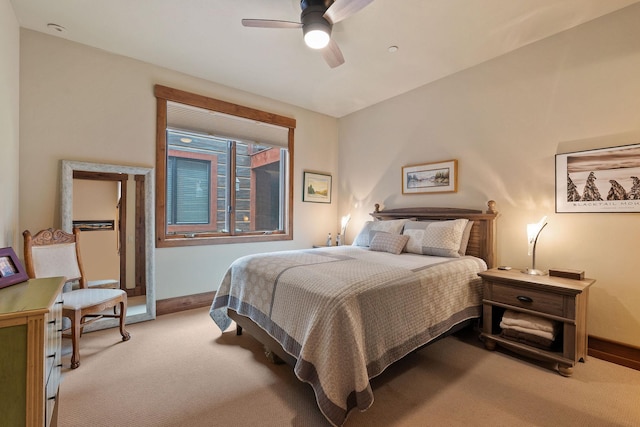 5675 US Highway 93 S Unit 10, Somers, MT 59932 - carpeted bedroom featuring baseboards and ceiling fan