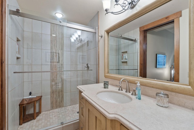 5675 US Highway 93 S Unit 10, Somers, MT 59932 - bathroom with vanity, a shower stall, and a chandelier