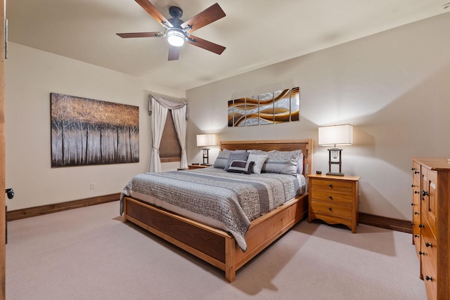 5675 US Highway 93 S Unit 10, Somers, MT 59932 - bedroom featuring light carpet, baseboards, and ceiling fan