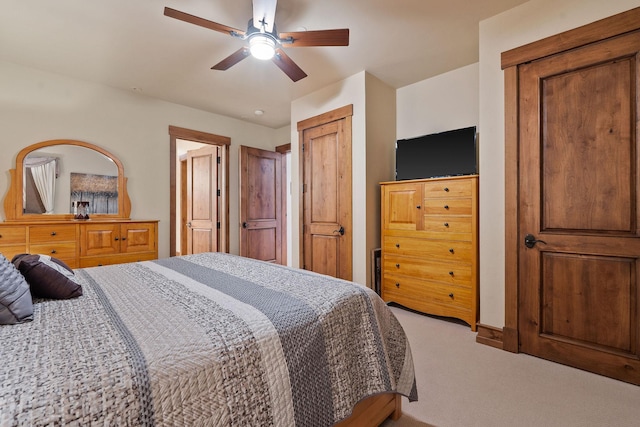 5675 US Highway 93 S Unit 10, Somers, MT 59932 - carpeted bedroom with a ceiling fan and baseboards
