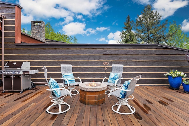 5675 US Highway 93 S Unit 10, Somers, MT 59932 - deck featuring a fire pit and area for grilling