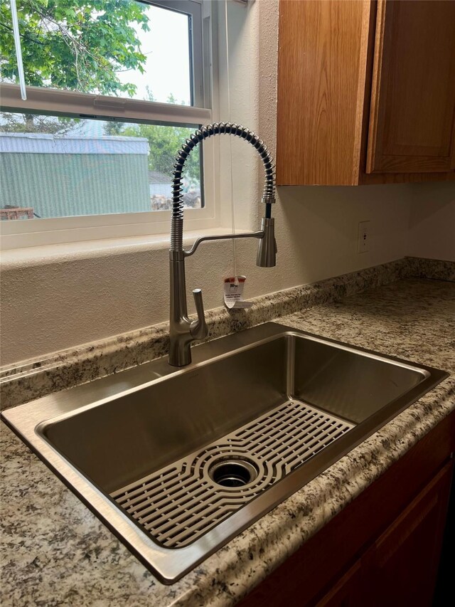 467 Grantsdale Rd Unit 16, Hamilton, MT 59840 - kitchen view of a sink and a textured wall