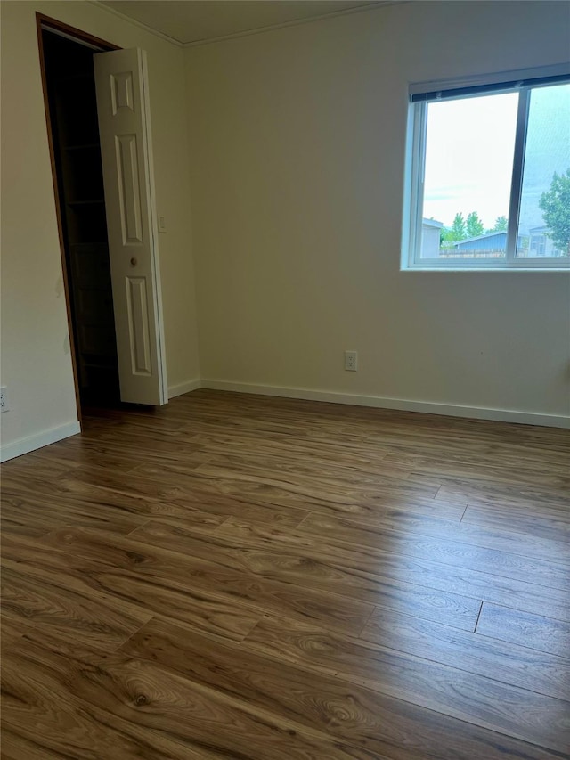 467 Grantsdale Rd Unit 16, Hamilton, MT 59840 - unfurnished room featuring dark wood-style floors and baseboards