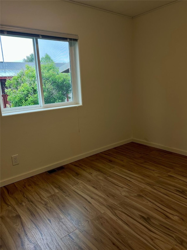 467 Grantsdale Rd Unit 16, Hamilton, MT 59840 - spare room featuring dark wood-type flooring and baseboards