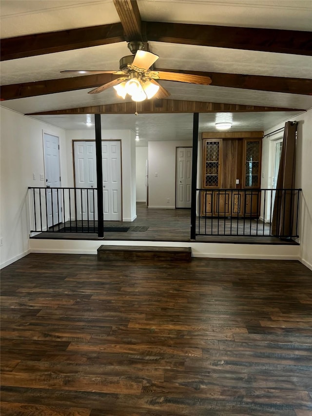 467 Grantsdale Rd Unit 16, Hamilton, MT 59840 - unfurnished room featuring wood finished floors, beamed ceiling, baseboards, and ceiling fan