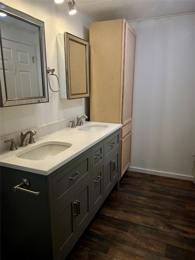 467 Grantsdale Rd Unit 16, Hamilton, MT 59840 - bathroom with double vanity and wood finished floors