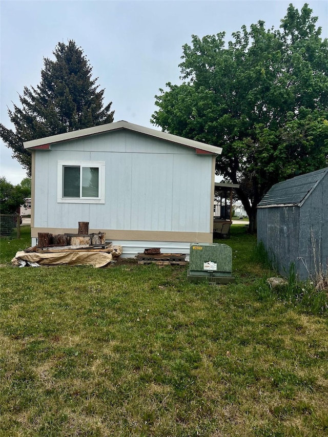 467 Grantsdale Rd Unit 16, Hamilton, MT 59840 - view of side of home featuring a yard