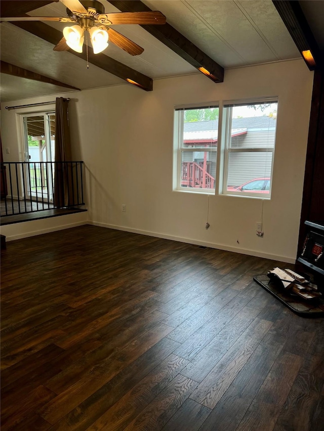 467 Grantsdale Rd Unit 16, Hamilton, MT 59840 - unfurnished living room featuring beam ceiling, a ceiling fan, baseboards, and wood finished floors