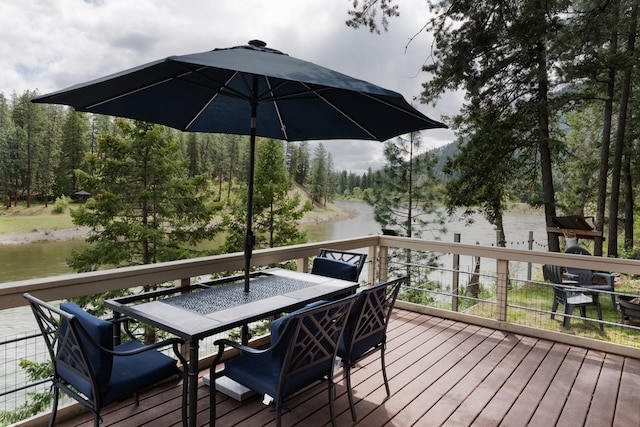 2055 Diamond Match Rd, Superior, MT 59872 - wooden terrace with a water view and outdoor dining area