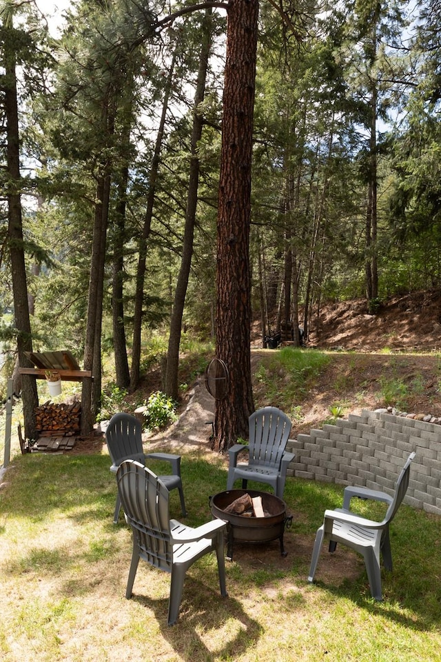 2055 Diamond Match Rd, Superior, MT 59872 - view of grassy yard featuring a fire pit