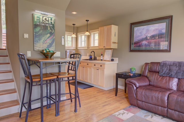 2055 Diamond Match Rd, Superior, MT 59872 - living area featuring light wood finished floors, recessed lighting, baseboards, and stairs