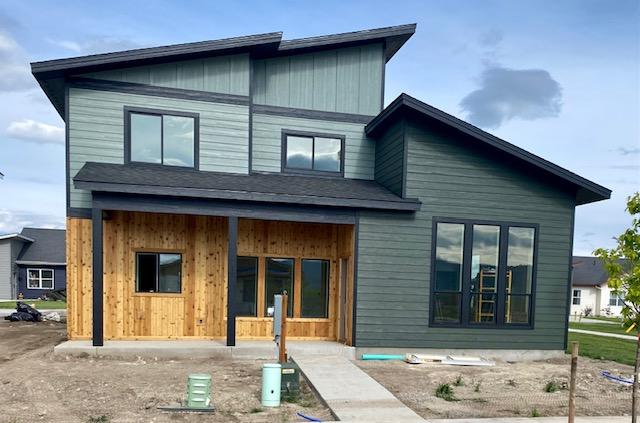 619 Holstein Way, Kalispell, MT 59901 - rear view of house with a porch