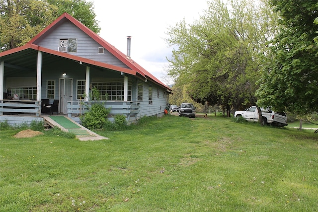 303 Swamp Creek Loop Rd, Trout Creek, MT 59874 - view of front facade featuring a front lawn
