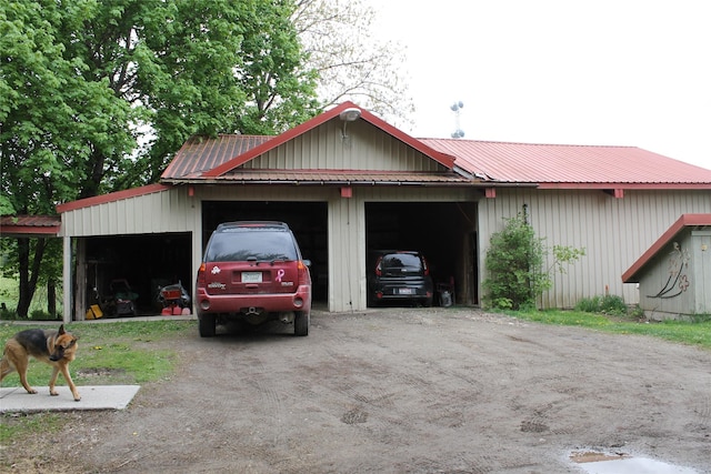 303 Swamp Creek Loop Rd, Trout Creek, MT 59874 - garage with a detached garage and driveway