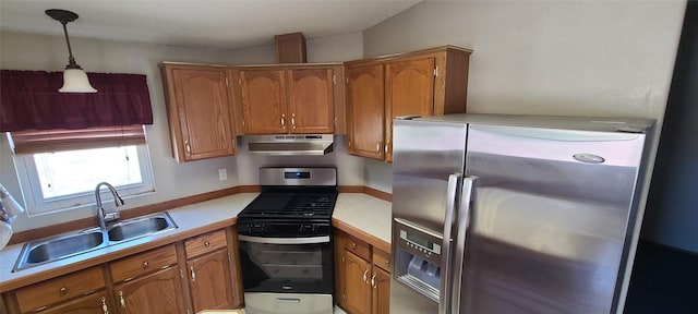 8 Teresa Ln, Great Falls, MT 59404 - kitchen with appliances with stainless steel finishes, under cabinet range hood, brown cabinets, and light countertops
