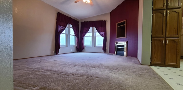 8 Teresa Ln, Great Falls, MT 59404 - unfurnished living room featuring a ceiling fan, light carpet, and vaulted ceiling