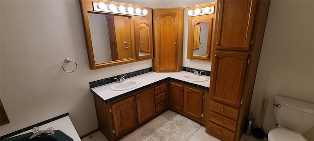 8 Teresa Ln, Great Falls, MT 59404 - bathroom with double vanity and toilet