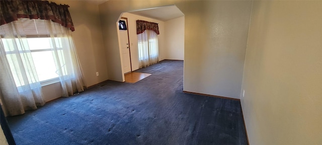8 Teresa Ln, Great Falls, MT 59404 - spare room featuring arched walkways and carpet floors