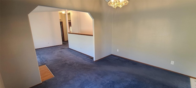 8 Teresa Ln, Great Falls, MT 59404 - spare room with carpet and a chandelier