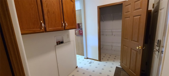 8 Teresa Ln, Great Falls, MT 59404 - washroom featuring light flooring, cabinet space, and hookup for a washing machine