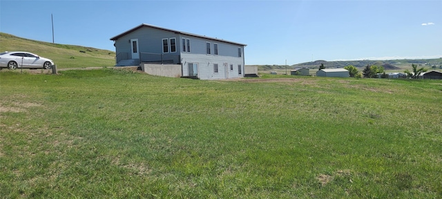 8 Teresa Ln, Great Falls, MT 59404 - back of property featuring a lawn