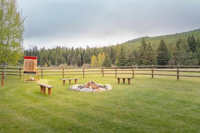 12520 Pinkham Creek Rd, Rexford, MT 59930 - view of yard with a wooded view and a fire pit