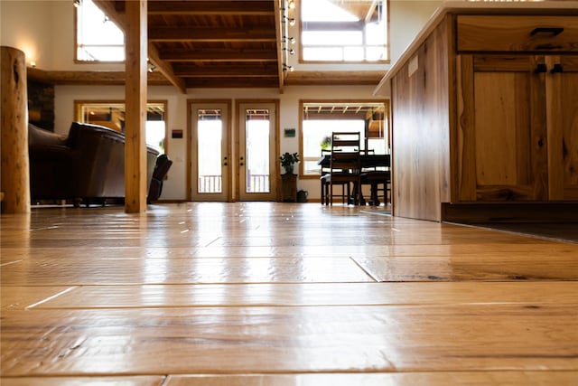 12520 Pinkham Creek Rd, Rexford, MT 59930 - entrance foyer with wood ceiling with exposed beams, hardwood / wood-style flooring, and french doors