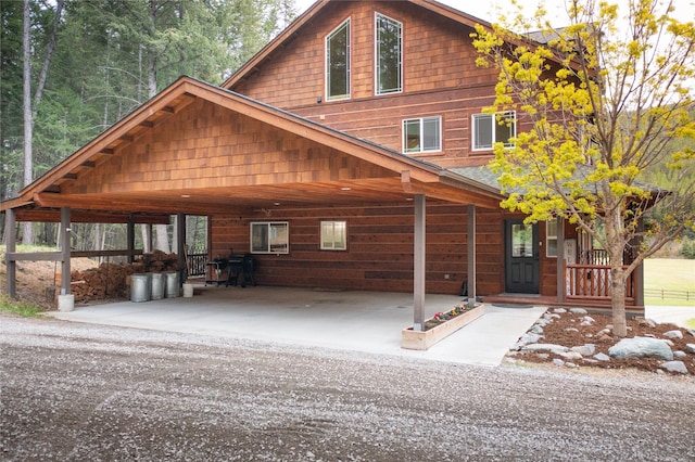 12520 Pinkham Creek Rd, Rexford, MT 59930 - chalet / cabin featuring a carport