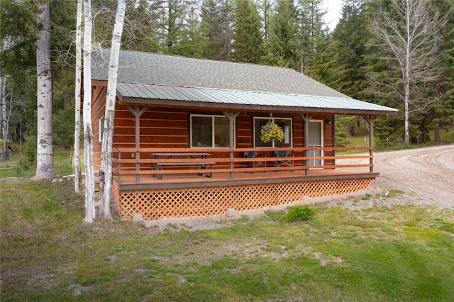12520 Pinkham Creek Rd, Rexford, MT 59930 - view of front of property featuring a porch and a front lawn