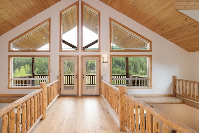 12520 Pinkham Creek Rd, Rexford, MT 59930 - hall with wood ceiling, wood-type flooring, high vaulted ceiling, and french doors