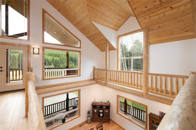 12520 Pinkham Creek Rd, Rexford, MT 59930 - stairs with plenty of natural light, wood ceiling, wood finished floors, and high vaulted ceiling