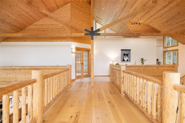 12520 Pinkham Creek Rd, Rexford, MT 59930 - corridor featuring wood ceiling, an upstairs landing, high vaulted ceiling, hardwood / wood-style floors, and baseboards