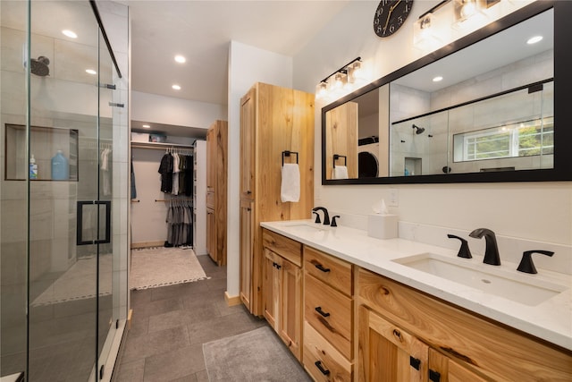 12520 Pinkham Creek Rd, Rexford, MT 59930 - bathroom featuring a shower stall, double vanity, a walk in closet, and recessed lighting
