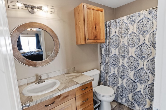 1091 Harmony Ct, Kalispell, MT 59901 - full bath featuring vanity, toilet, and a shower with curtain