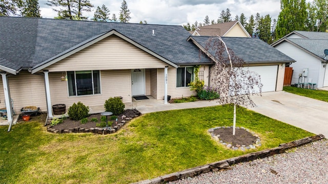 1091 Harmony Ct, Kalispell, MT 59901 - ranch-style house featuring a garage, concrete driveway, a front yard, and a shingled roof